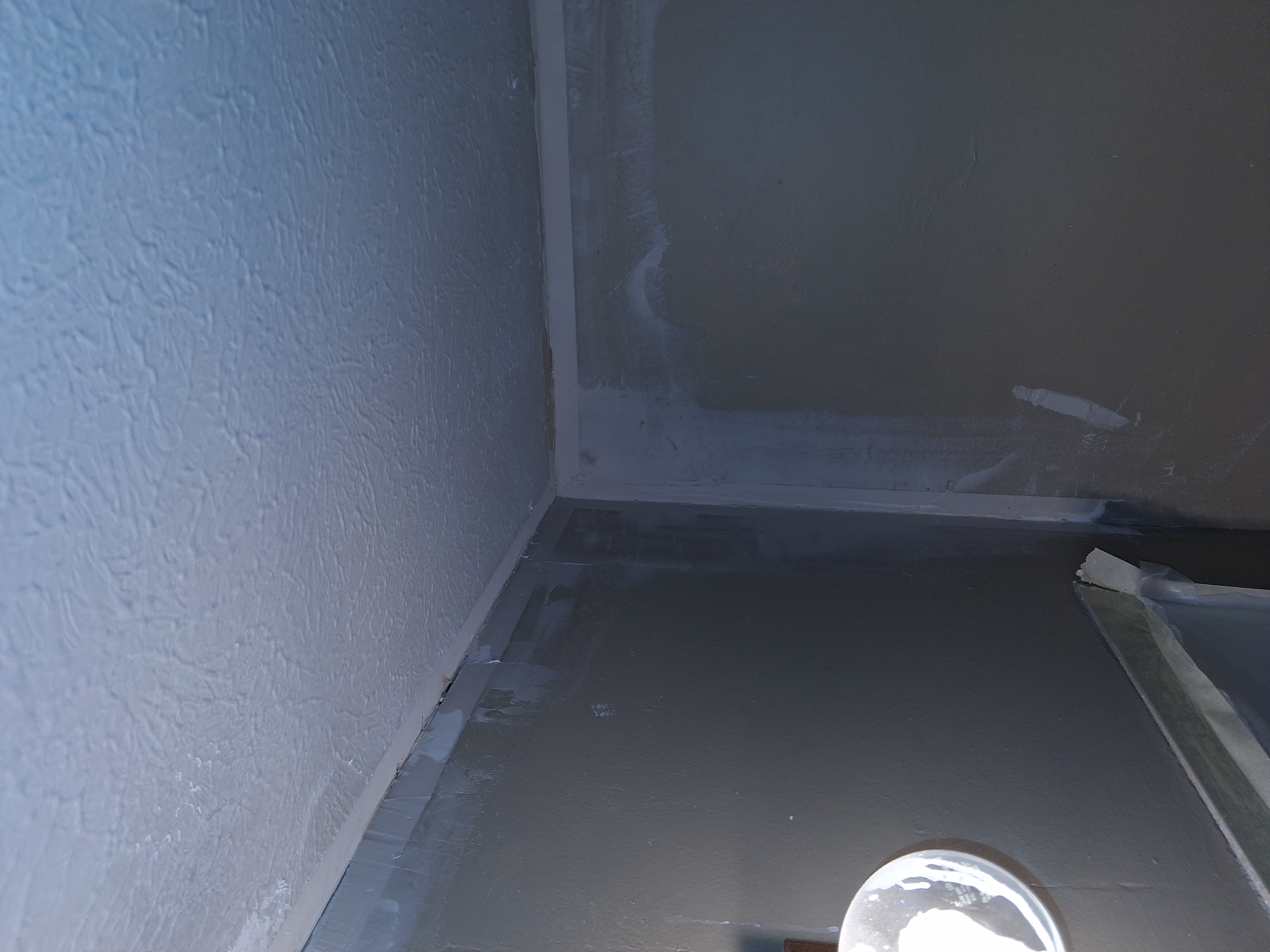 Drywall repair preparation and patching work